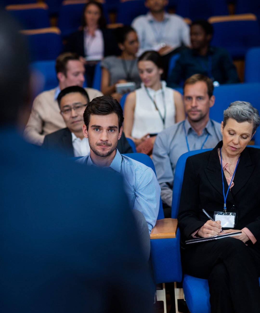 Business executives participating in a business meeting at conference center