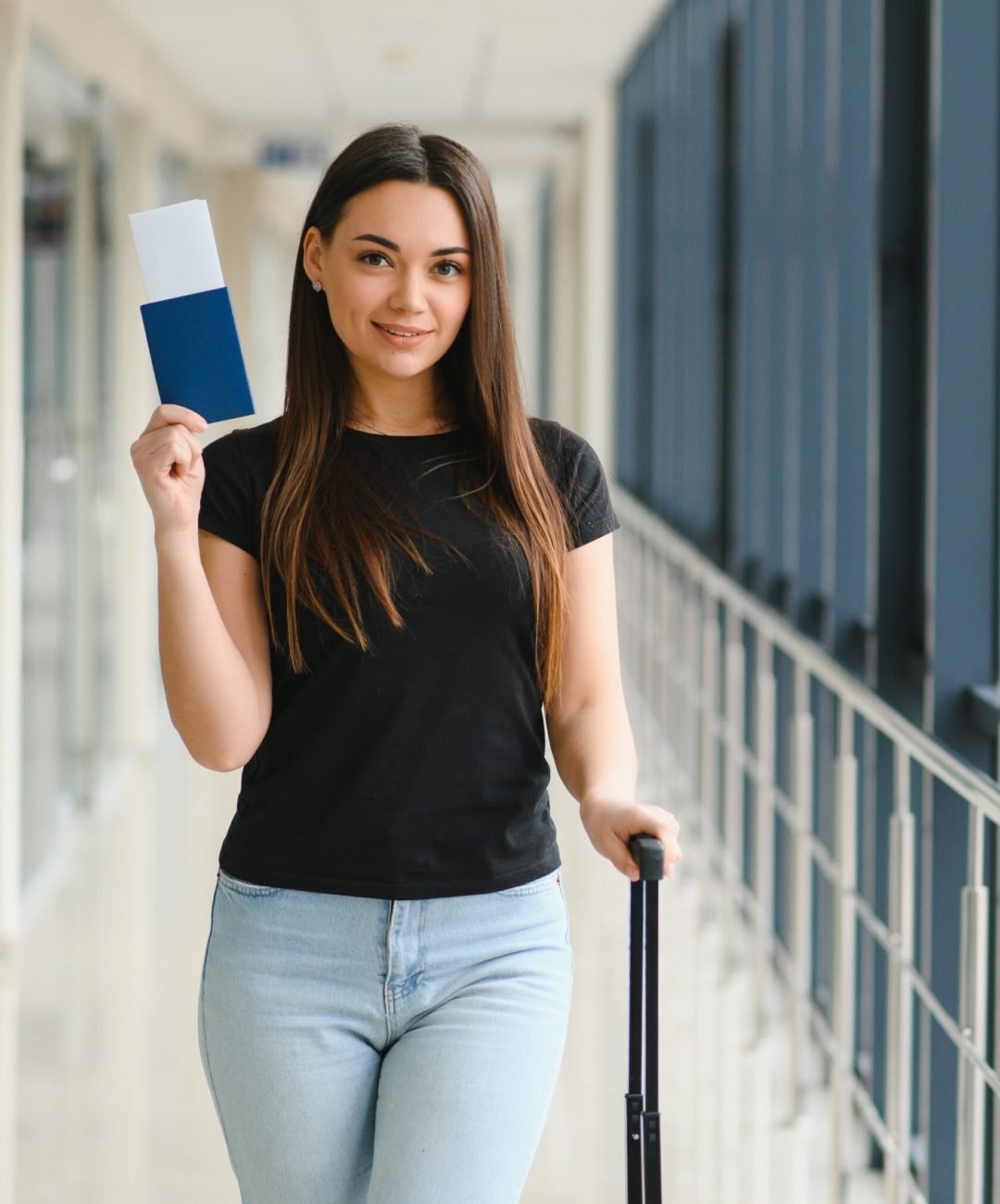 pretty woman waiting for her flight at airport.